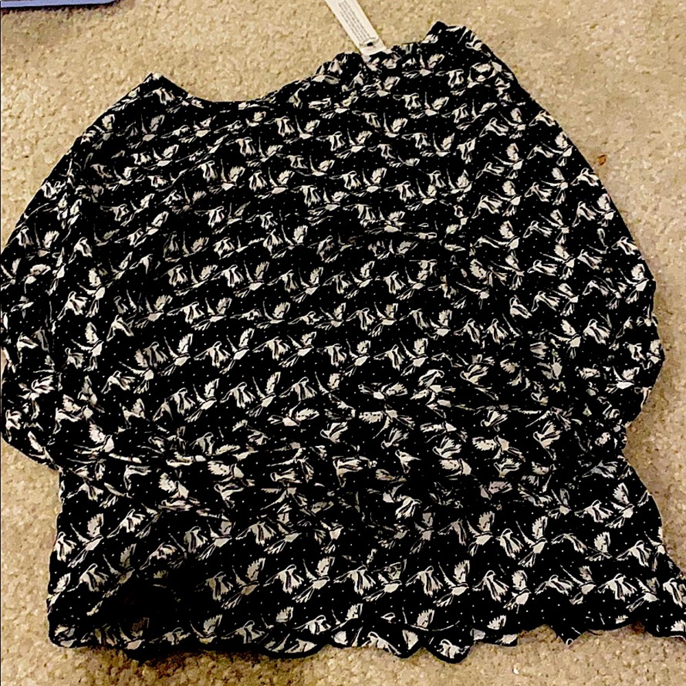 black shirt with birds and dots with buttons